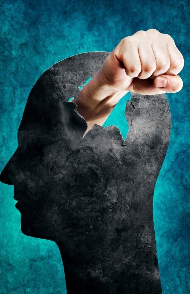 illustration of human hand punching through a human head silhouette representing bashing out negative thoughts